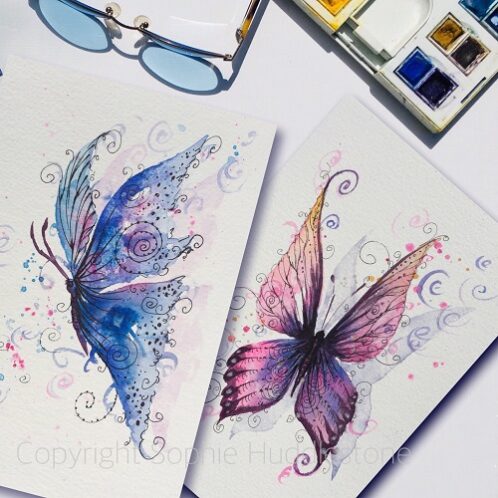 Blue and purple butterfly art by Sophie